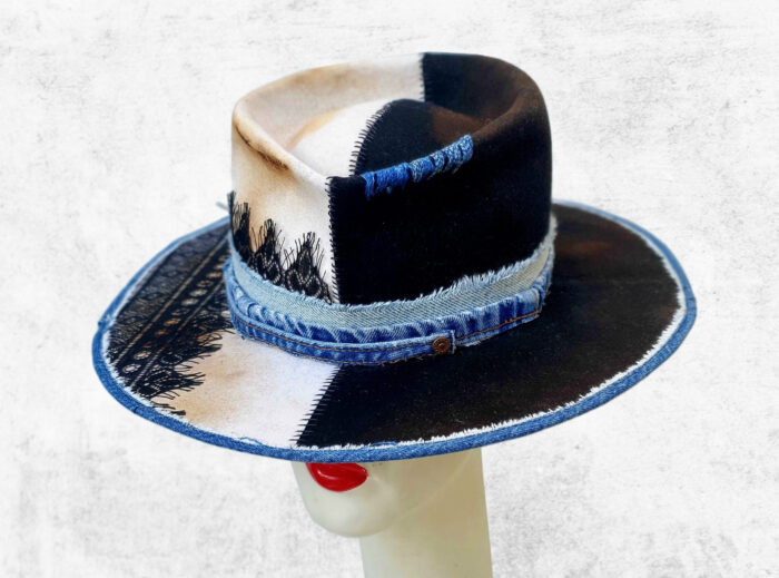 black and white fel hat with denim jeans details and lace