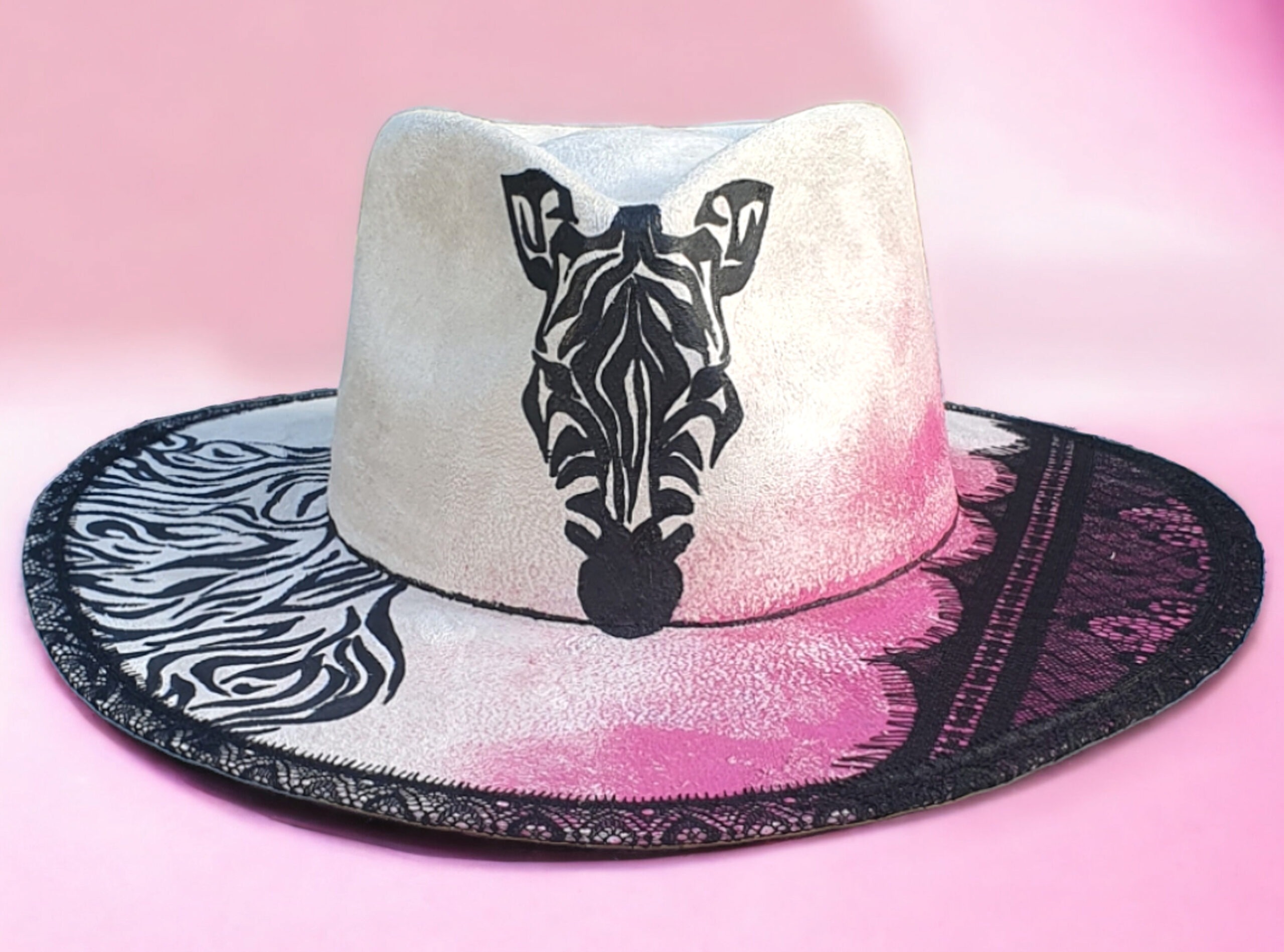 Whitw pink handpainted zebra hat with black lace and painted details