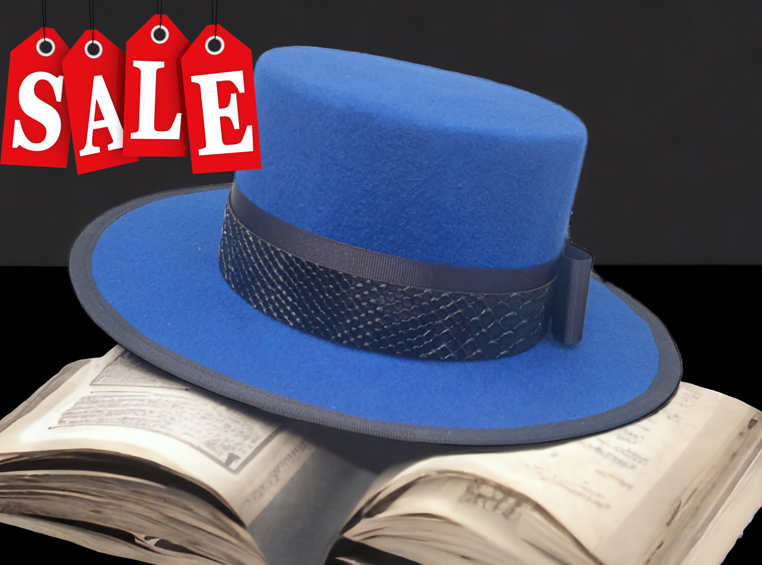 electric blue felt hat canotire with black decor on the crown
