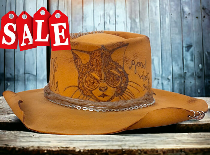 engraved felt hat with a cat on it and message yellow burnt
