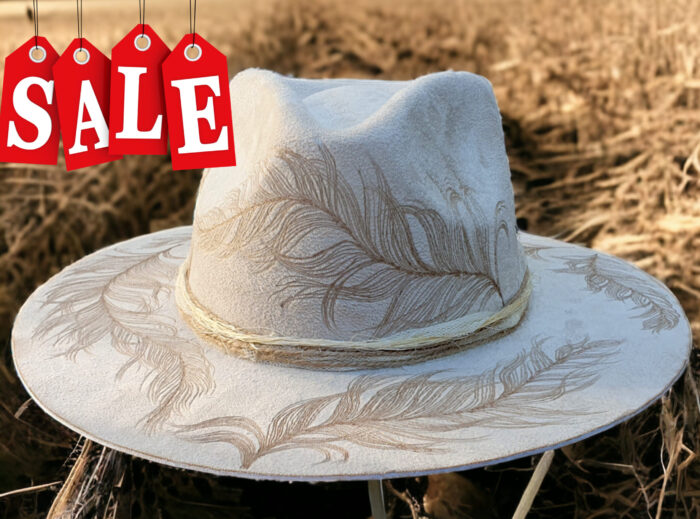 white suede tattoo hat with feathers
