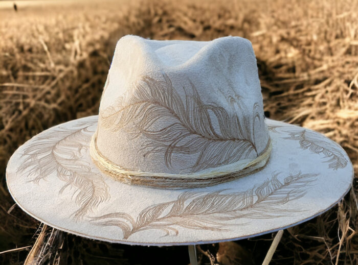 white suede tattoo hat with feathers