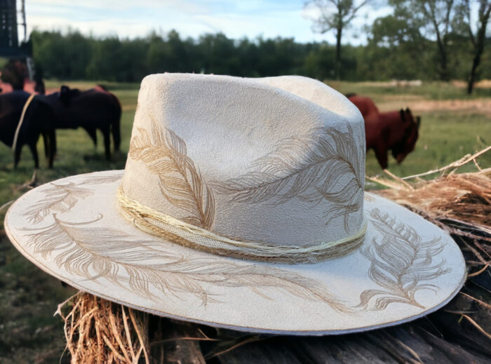 white suede tattoo hat with feathers