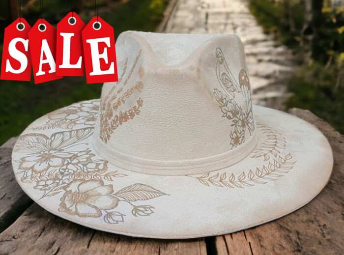 white engraved hat with flowers