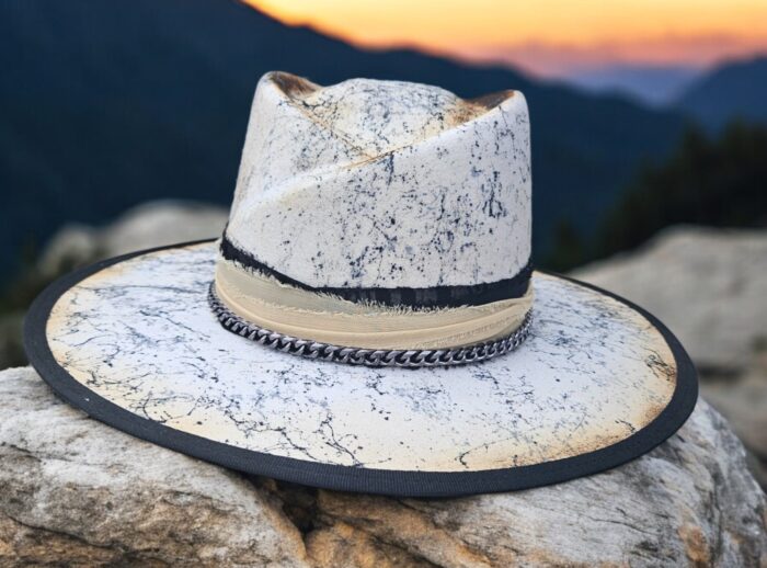 white handpainted hat with black and grey accents, unique crown shape, burnt felt