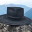 simple black wool felt hat with painting accents