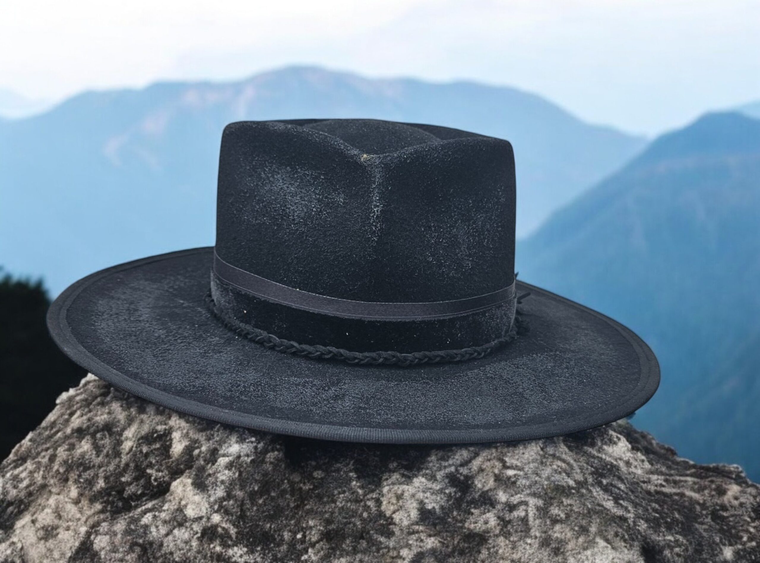 simple black wool felt hat with painting accents